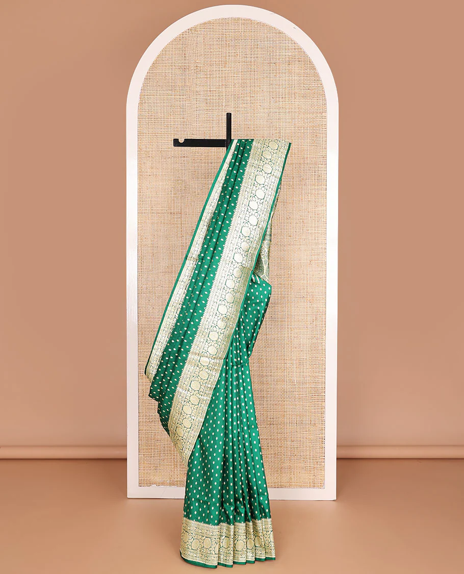 Green banarasi silk saree with zari buttas, zari border of floral creeper designs & zari-rich pallu of intricate floral designs