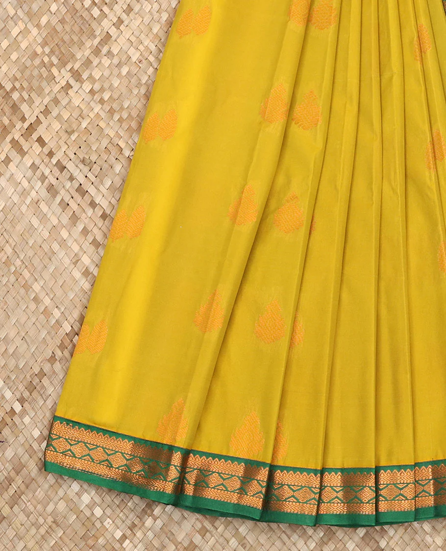 Green Budget Silk Saree Elevated with Zari Buttas, Featuring a Contrast Traditional Zari Design Small Border, Pallu Adorned with Floral Jaal Design, and a Contrast Blouse