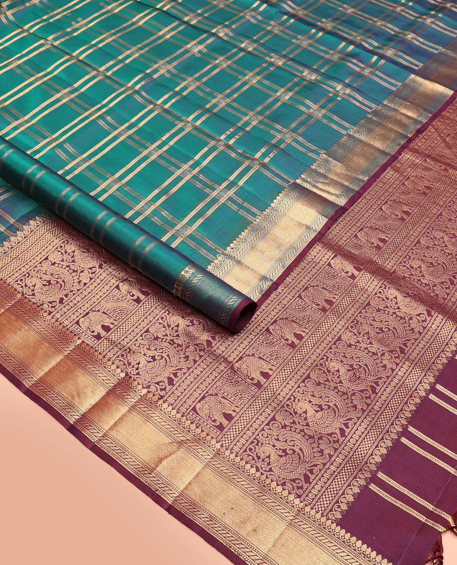 Green butta enclosed checked Mayuri soft silk saree, zari border of thilakam mokku, banaras, muthu, puli nagam, and vanki designs, and contrast pallu of mayil and yaanai designs - Image 2