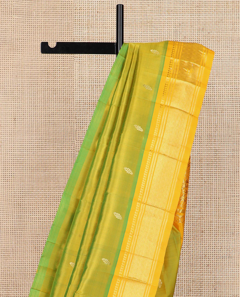 Green buttas Kanchipuram silk saree, contrast border of panner sombu, banaras & jaal design & floral design pallu - Image 4