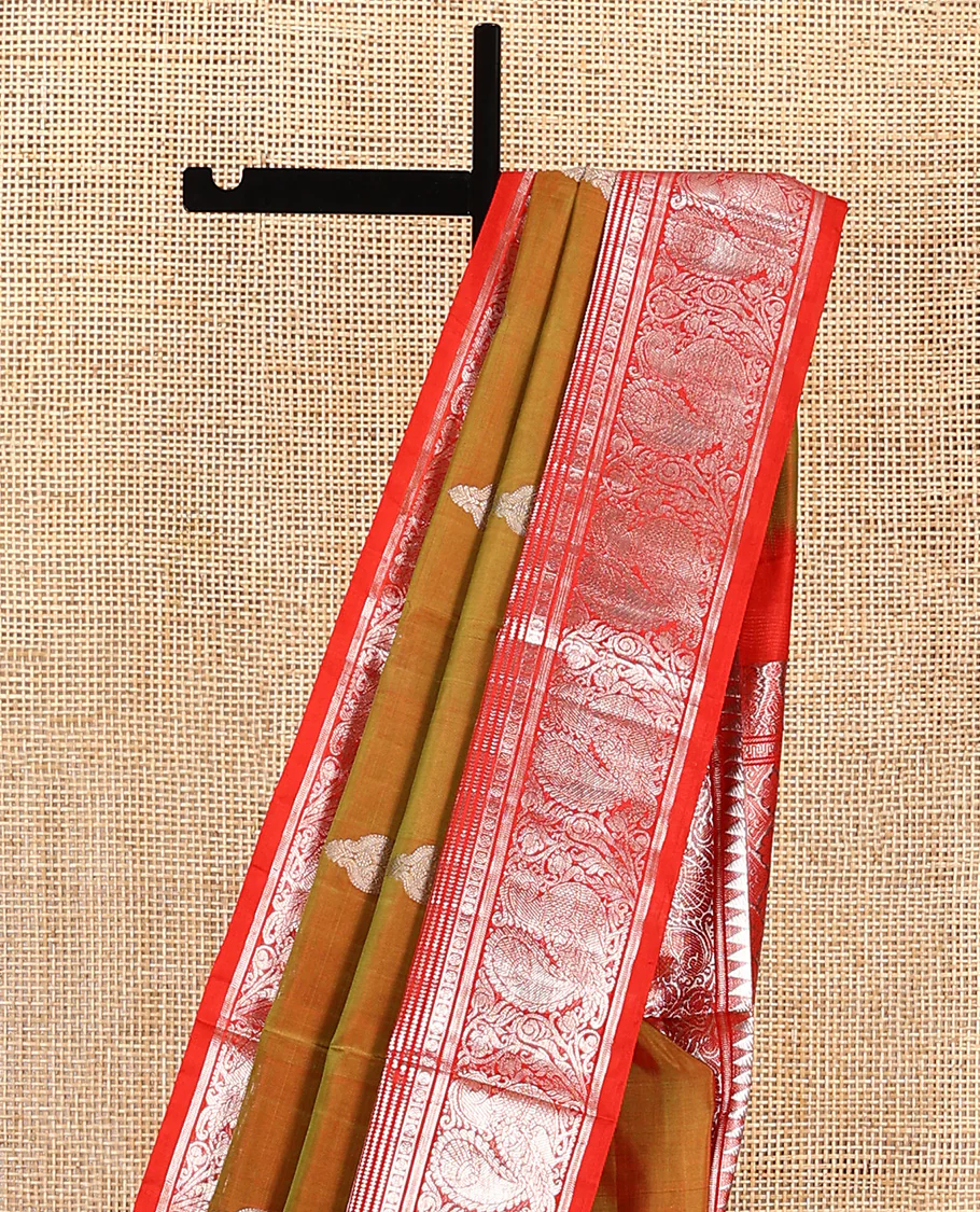 Green buttas Venkatagiri silk saree, contrast temple traditional border of peacocks, and intricate pallu - Image 3
