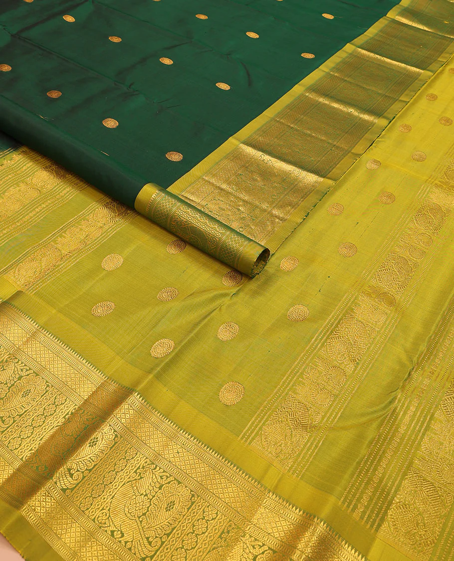 Green chakram zari buttas Kanchipuram silk saree, contrast border of rekku, muthu, mayil kann, and mayil designs, and mayil chakram motifs featured pallu - Image 2