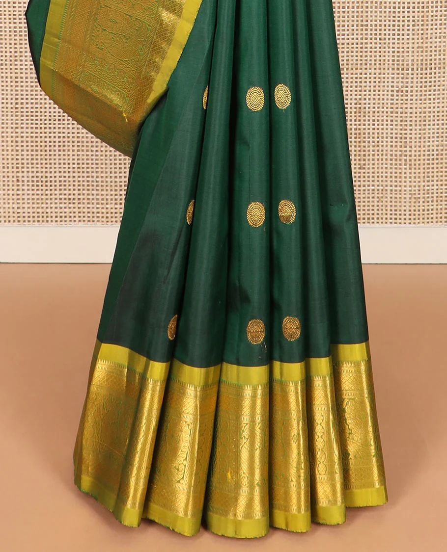Green chakram zari buttas Kanchipuram silk saree, contrast border of rekku, muthu, mayil kann, and mayil designs, and mayil chakram motifs featured pallu - Image 4