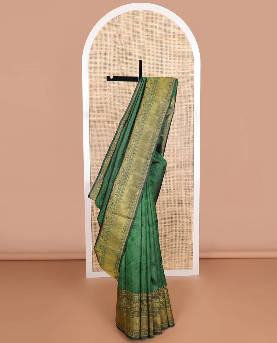 Green checked, floral design Parampara silk saree with self border of manga, paun, muth, kathir design & jaal design pallu