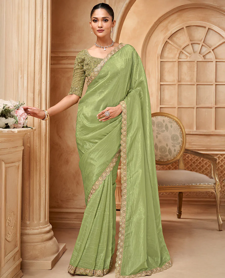 Green crushed designer saree, scallop embroidered border, and embroidered blouse