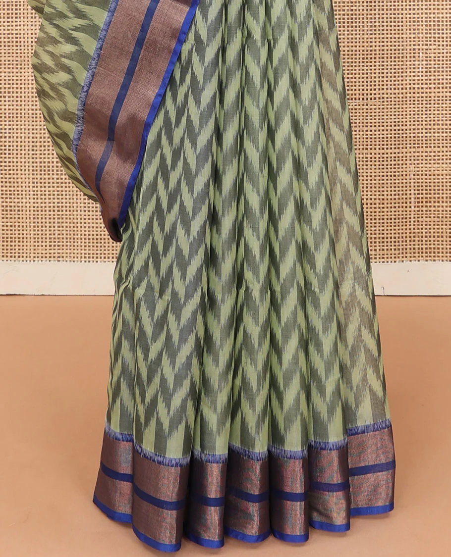 Green ikkat chevron designs silk cotton saree, contrast zari border, and pallu of ikkat designs - Image 4