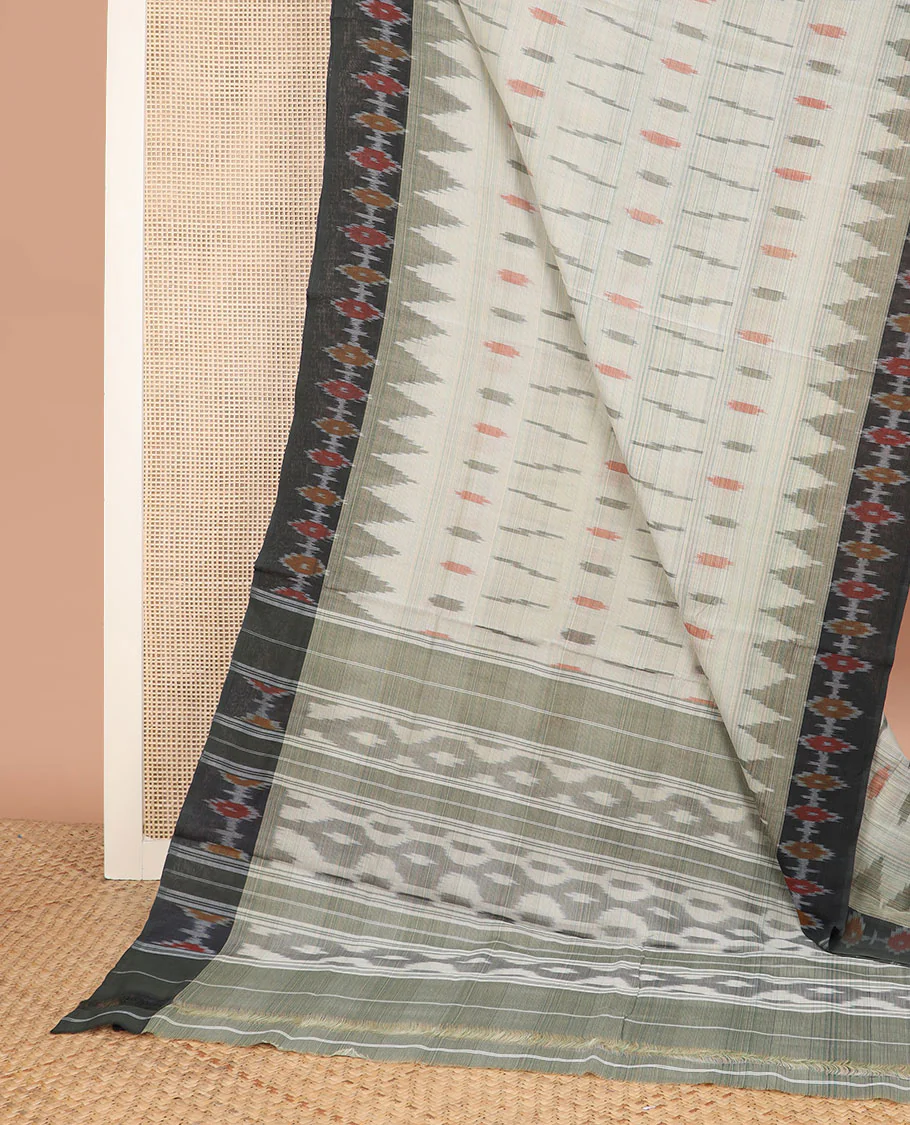 Green Ikkat Cotton Saree Adorned with Ikkat Buttas, Complemented by a Contrast Ikkat Design Border, and Pallu of Geometric Ikkat Patterns - Image 2