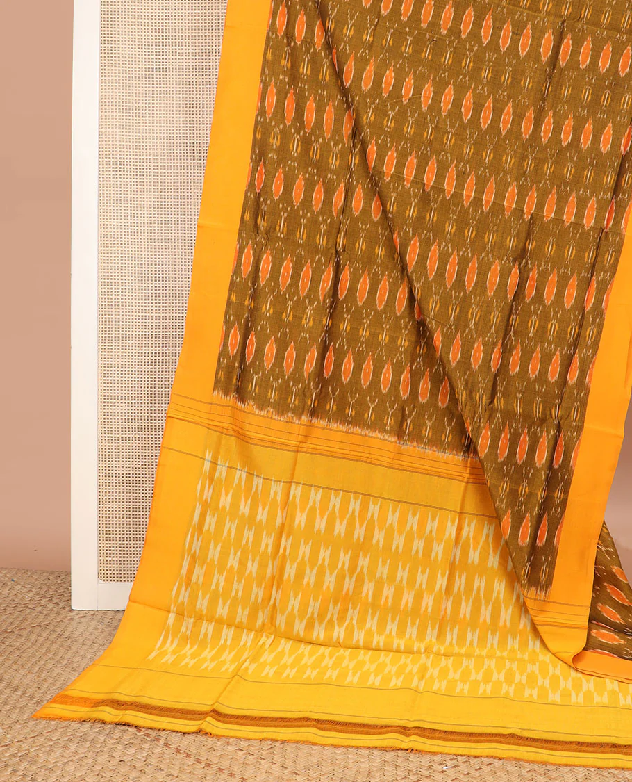 Green Ikkat Cotton Saree Bedecked with Ikkat Ogee Patterns, Complemented by a Contrast Border, and Pallu of Geometric Ikkat Patterns - Image 2