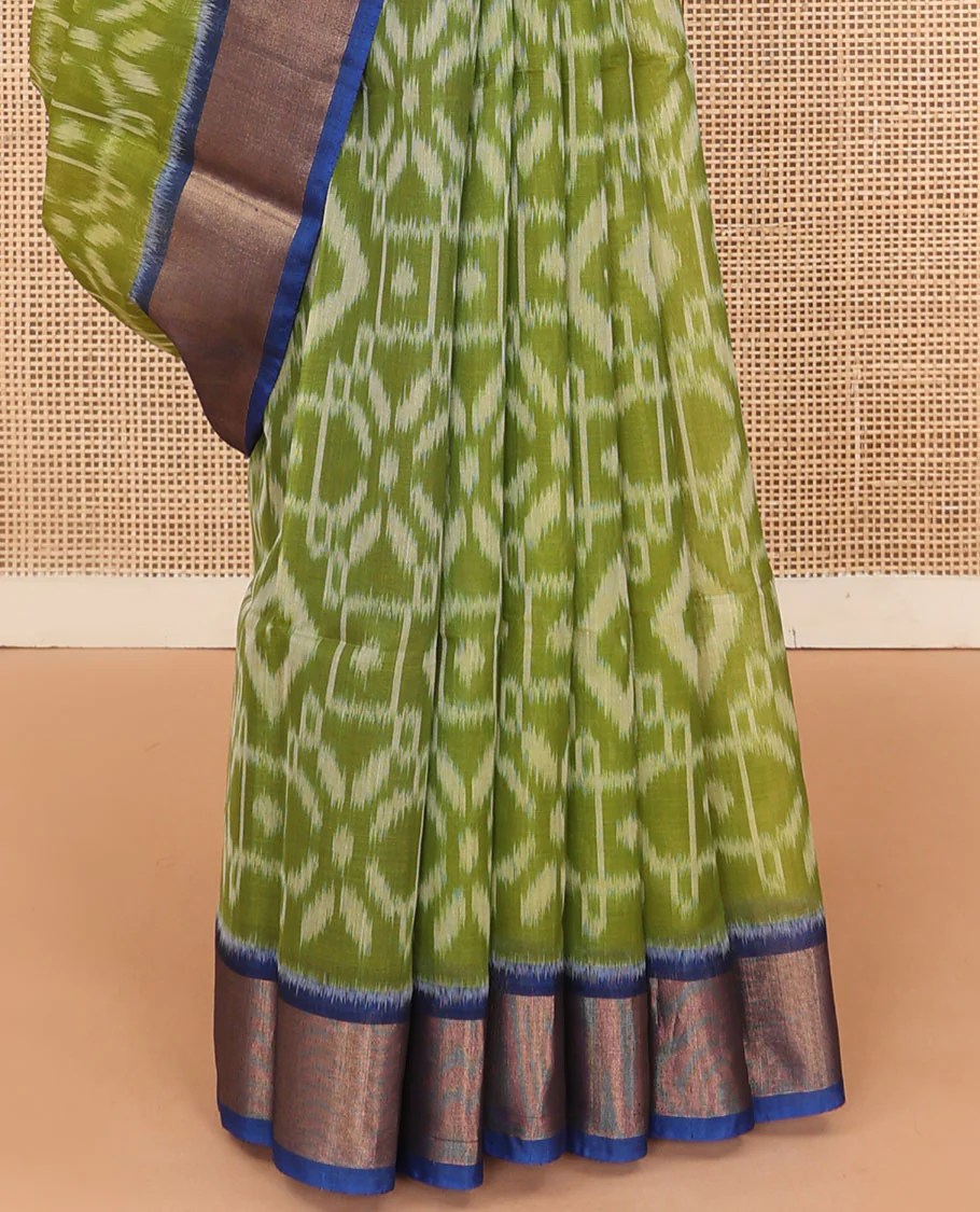 Green ikkat design silk cotton saree, contrast bavanji border, and pallu of ikkat designs - Image 4