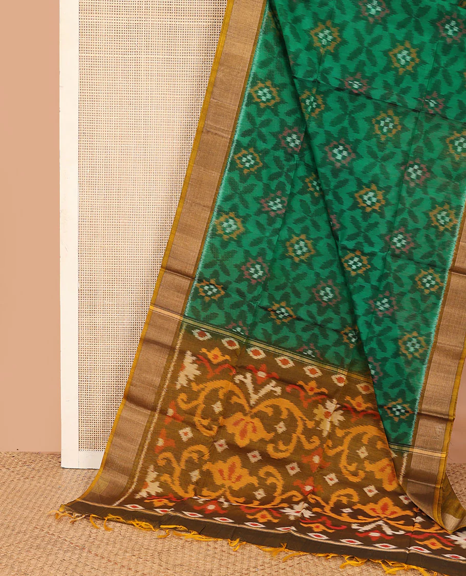 Green ikkat floral patterned silk cotton saree, contrast bavanji border, and pallu of ikkat Mughal style design weave - Image 2