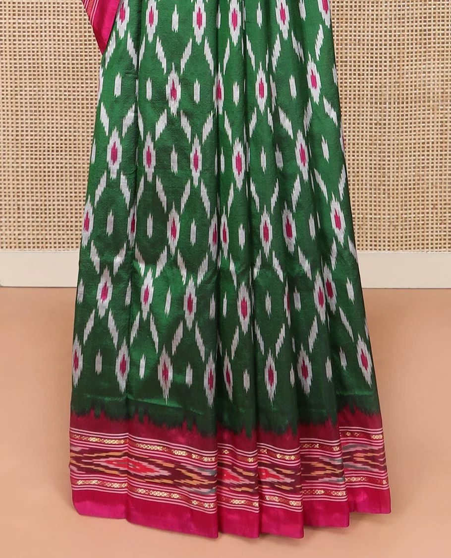Green Ikkat Silk Saree Adorned with Geometric Patterns, Complemented with Contrast Ikkat-Textured Border, and Pallu Features Stripes and Ikkat Texture - Image 4