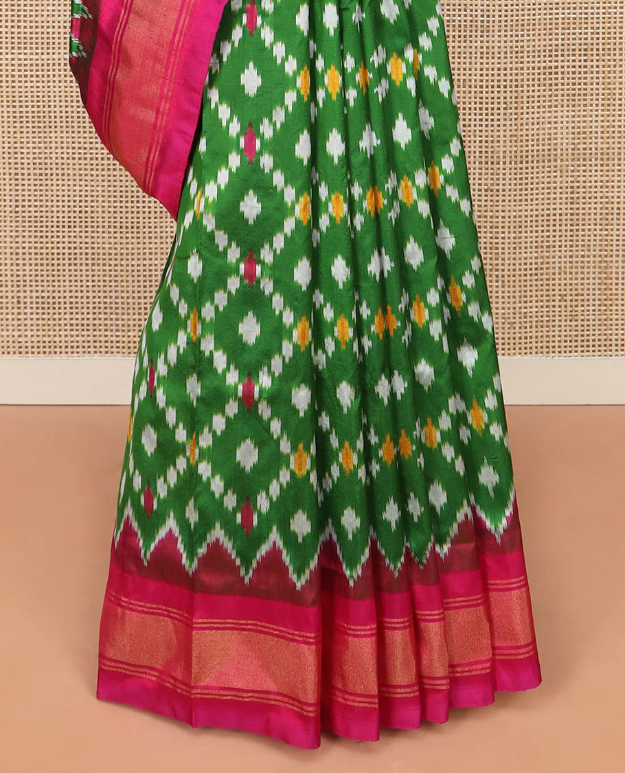 Green Ikkat Silk Saree with Ikkat Buttas Enclosed Jaal Design, Spotlighted with a Contrast Temple Border, Pallu Features Ikkat Jaal Patterns, and with a Contrast Blouse - Image 4