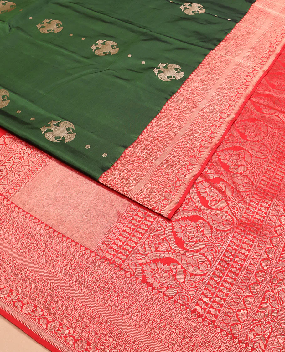 Green iruthalai pakshi buttas Vasundhara silk saree with contrast border of thilakam mokku, leaf vine, paisa, and kodi visiry designs, and intricate pallu - Image 2
