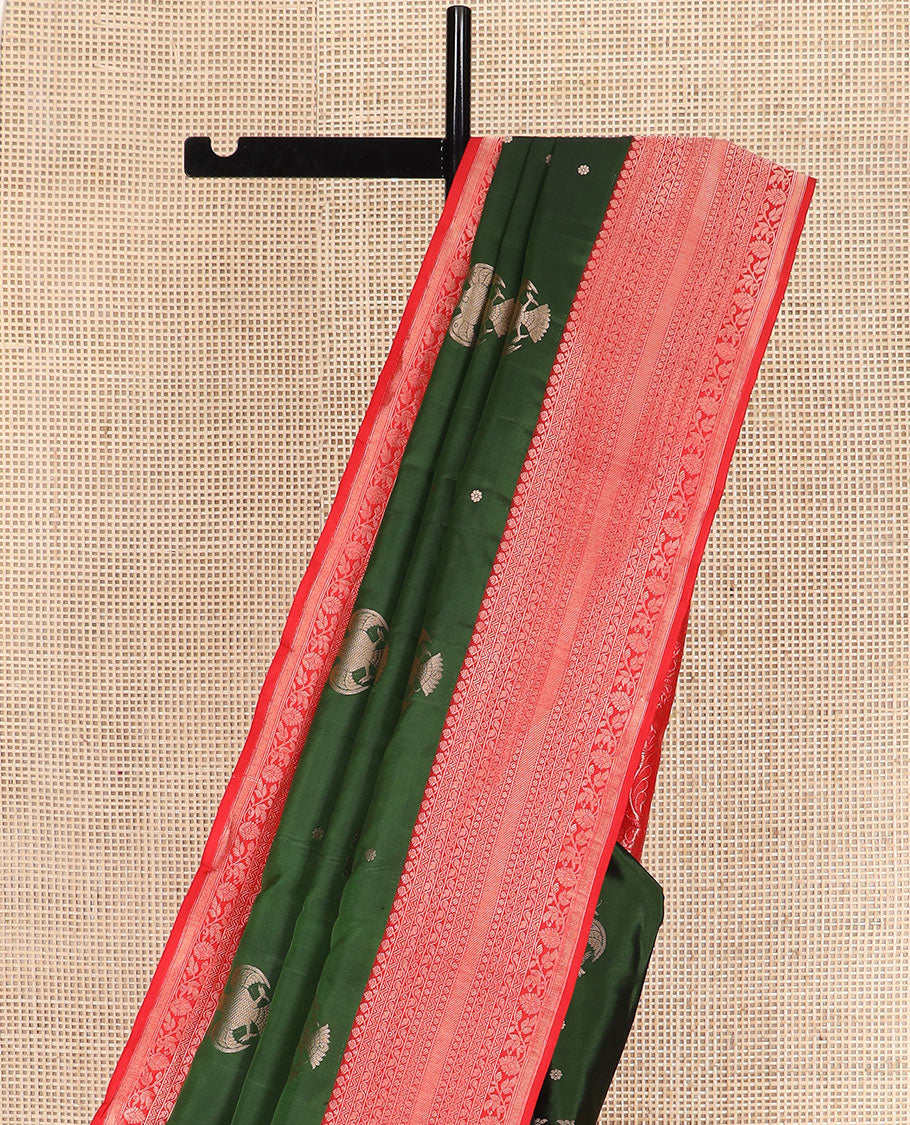 Green iruthalai pakshi buttas Vasundhara silk saree with contrast border of thilakam mokku, leaf vine, paisa, and kodi visiry designs, and intricate pallu - Image 3