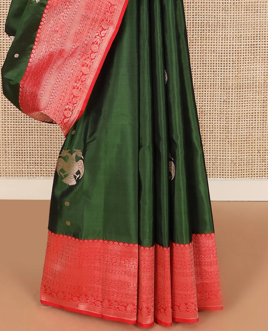 Green iruthalai pakshi buttas Vasundhara silk saree with contrast border of thilakam mokku, leaf vine, paisa, and kodi visiry designs, and intricate pallu - Image 4