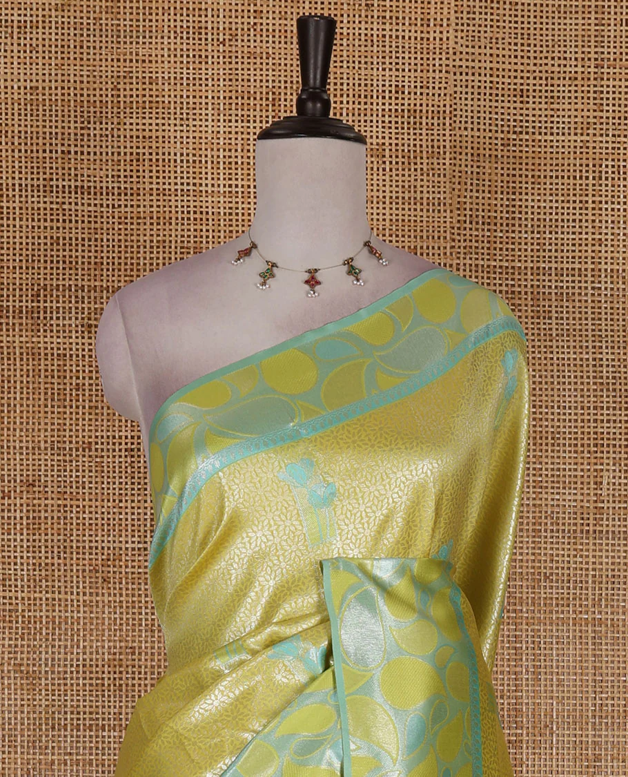 Green jacquard kanchi silk saree, contrast border, and pallu steeped with paisley motifs with contrast zari design blouse - Image 3