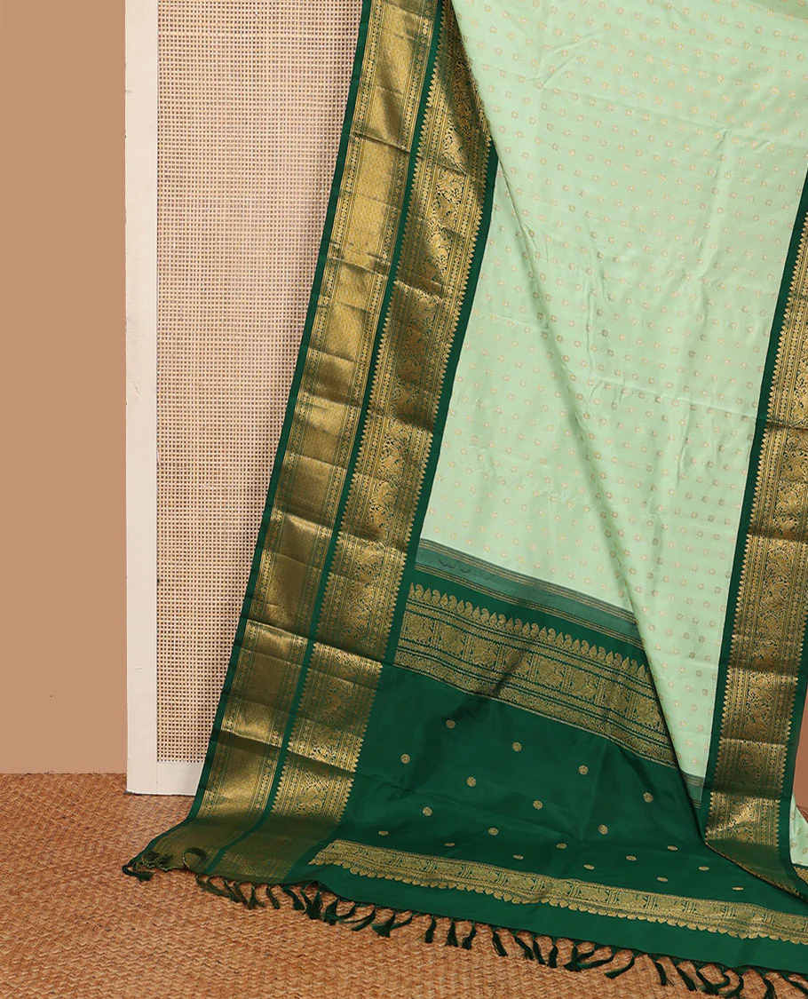 Green kamalam buttas Kanchipuram silk sareee, contrast korvai border of thilakam mokku, kathir, rudraksham, mayil, yaali and jaal design, and zari motifs pallu - Image 2