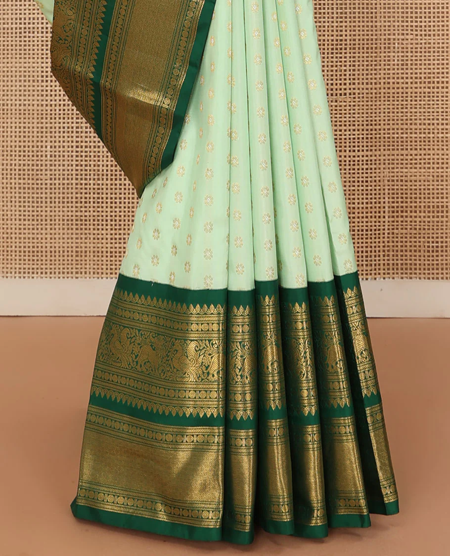 Green kamalam buttas Kanchipuram silk sareee, contrast korvai border of thilakam mokku, kathir, rudraksham, mayil, yaali and jaal design, and zari motifs pallu - Image 4