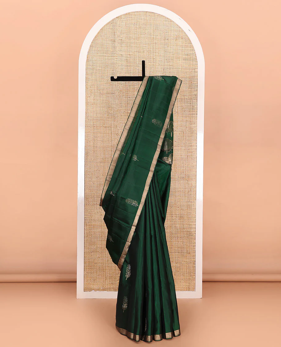 Green leaf buttas Mayuri soft silk saree, piping zari border, and pallu steeped with unique leaf motifs