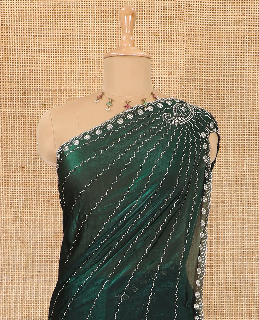 Green micro-stone work fendy chiffon saree with paisley stone work on its shoulder, a scallop stone work border, a butterfly style pallu, and a matching stone work blouse - Image 3