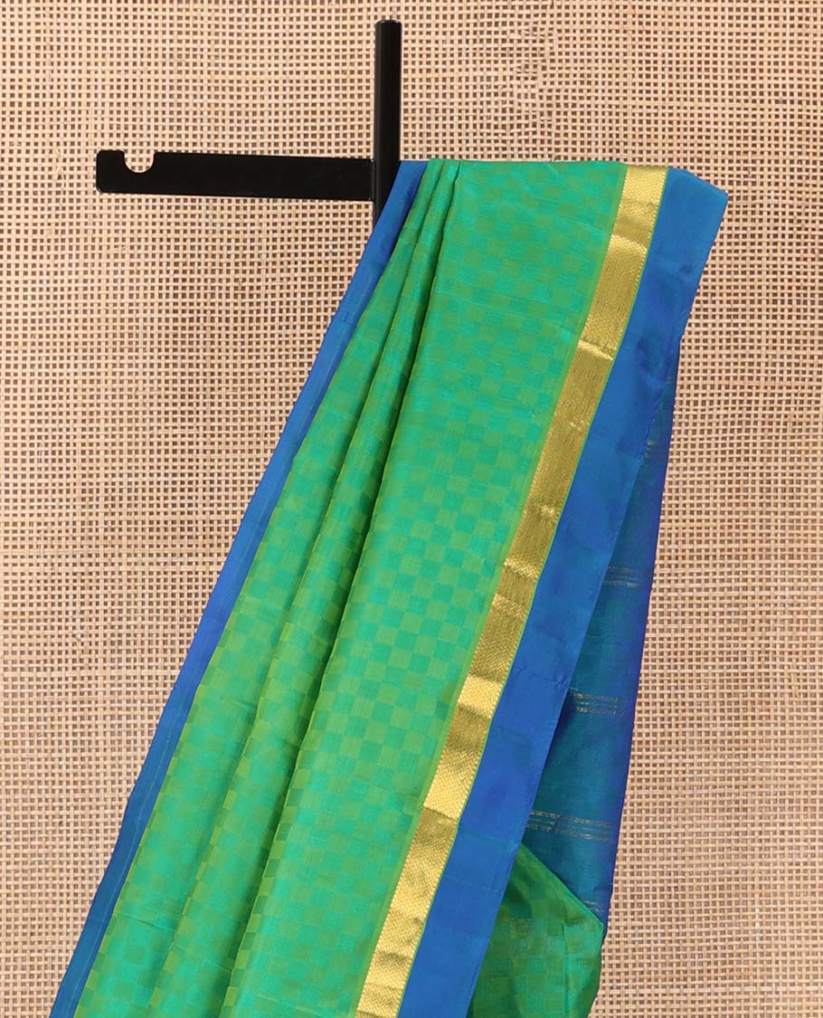 Green paiyadi kattam Kanchipuram silk saree, contrast border of muthu, and vanki designs, and zari striped pallu - Image 4