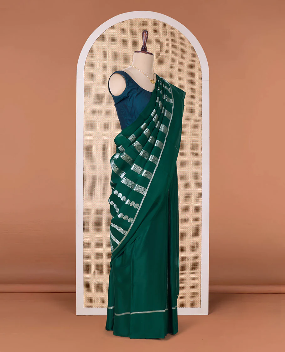 Green peacock, elephant, and floral creeper striped Mysore silk saree, self-border, and pallu of kanchipuram inspired flora-fauna designs