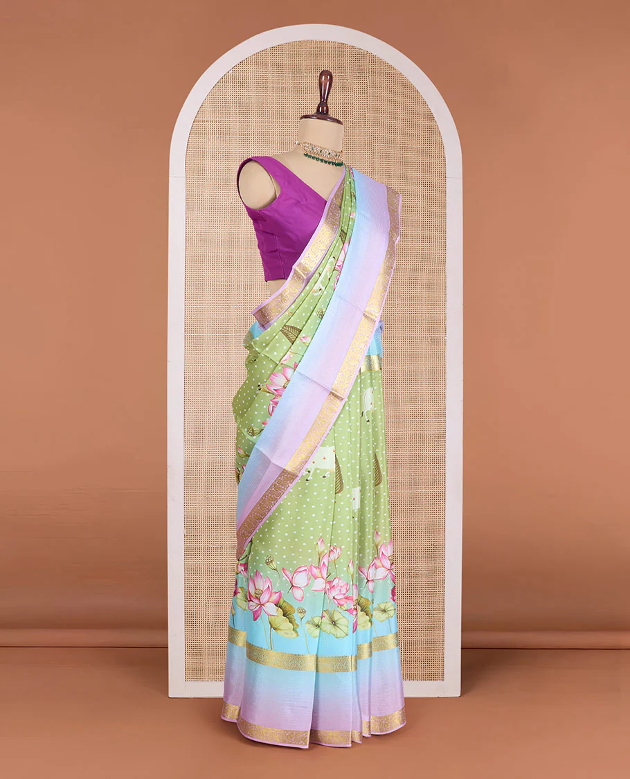Green pichwai cow and lotus vine printed Mysore silk saree, contrast ombre-styled traditional zari design border, and floral design pallu