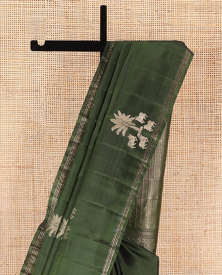 Green pichwai cow motifs Mayuri soft silk saree, zari piping border, and pallu of geometric designs - Image 3