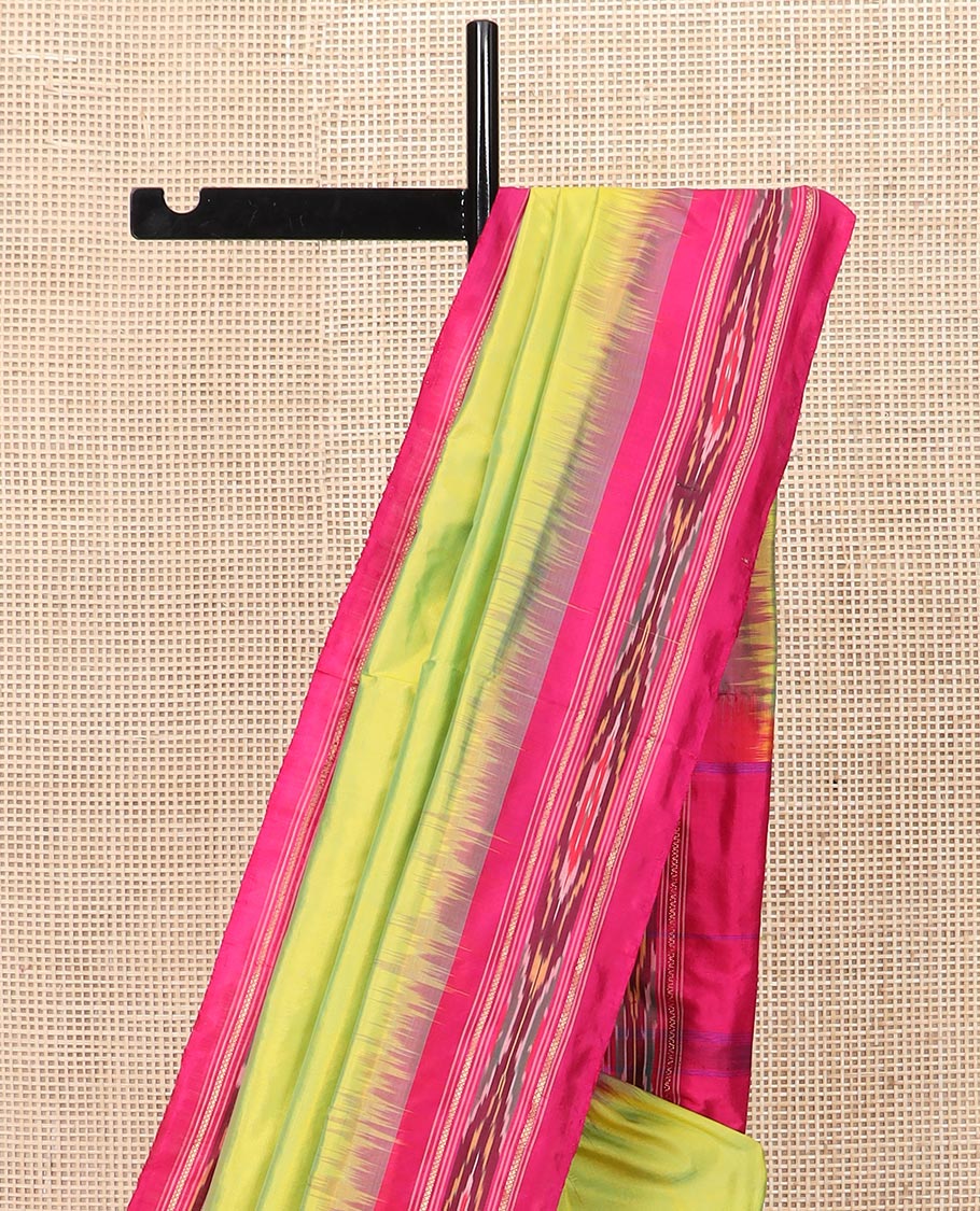 Green Plain Ikkat Silk Saree with a Contrast Rani Pink Border Accentuated by a Hazy Ikkat Weave, Featuring a Pallu Flanked by Stripes and Ikkat Texture - Image 3