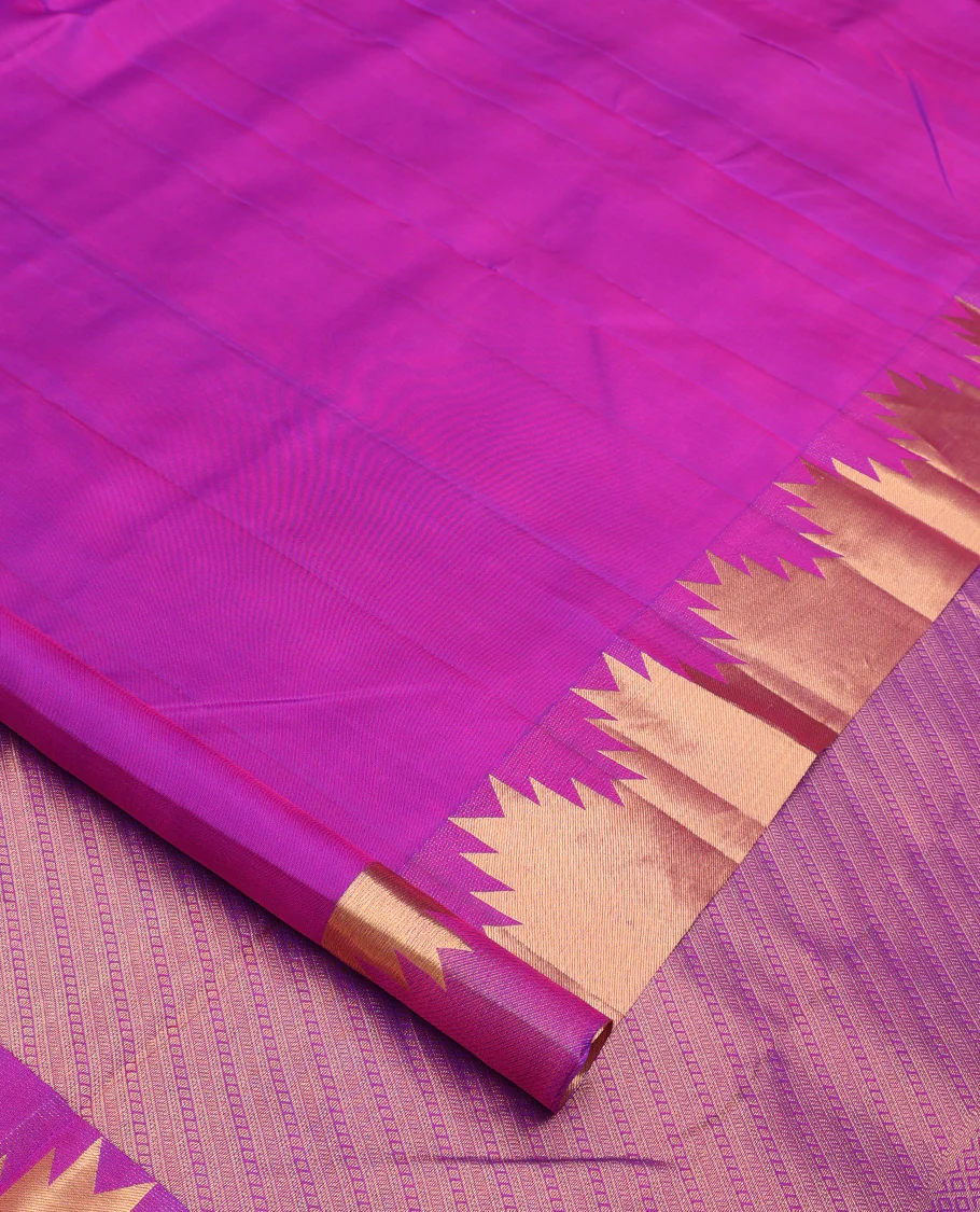 Rani pink plain Kanchipuram silk saree, thazampoo rekku zari border, and diagonally woven geometric patterned pallu - Image 2