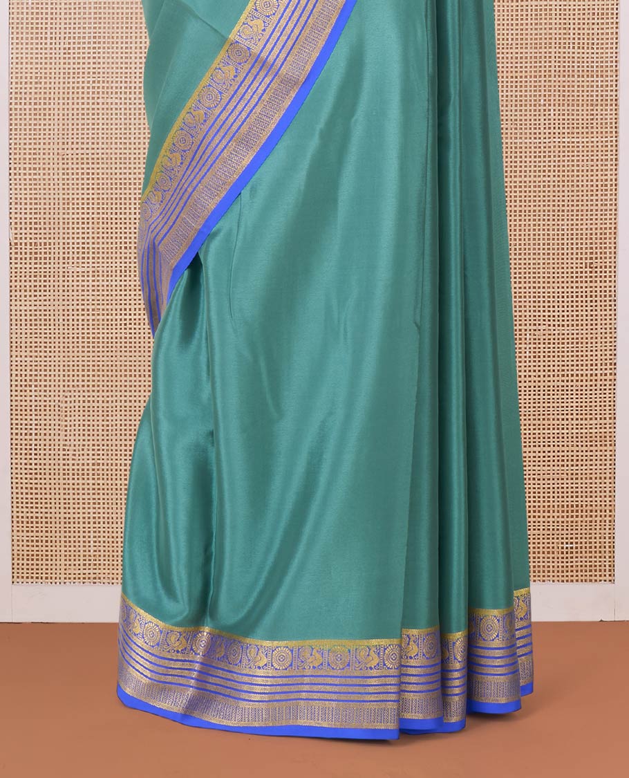 Green plain Mysore silk saree, contrast traditional zari border of Peacock and chakram and pallu of traditional designs - Image 4