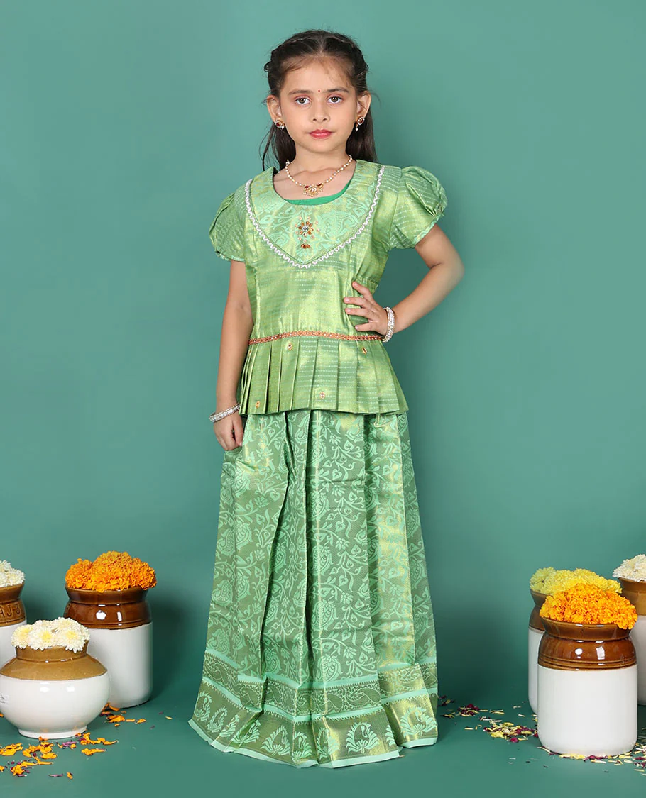 Green readymade art silk pavadai set, floral jaal jacquard with traditional zari border skirt, jacquard embroidered puff-sleeve blouse - Image 3
