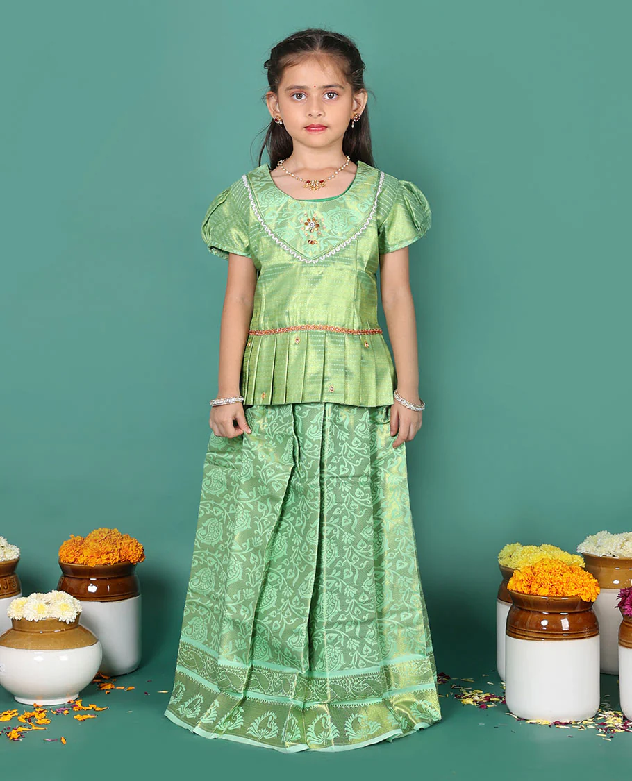 Green readymade art silk pavadai set, floral jaal jacquard with traditional zari border skirt, jacquard embroidered puff-sleeve blouse - Image 4