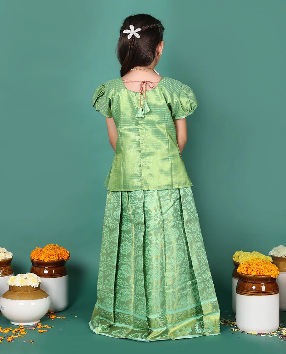 Green readymade art silk pavadai set, floral jaal jacquard with traditional zari border skirt, jacquard embroidered puff-sleeve blouse - Image 5