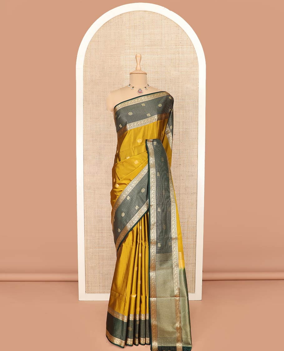 Green Semi-Soft Silk Saree Decorated with Peacock Chakram Buttas, Complemented by Contrast Traditional Zari Border Featuring Peacock Chakram Designs, Meticulously Woven Pallu of Jaal Designs, and Paired with a Contrast Blouse - Image 3