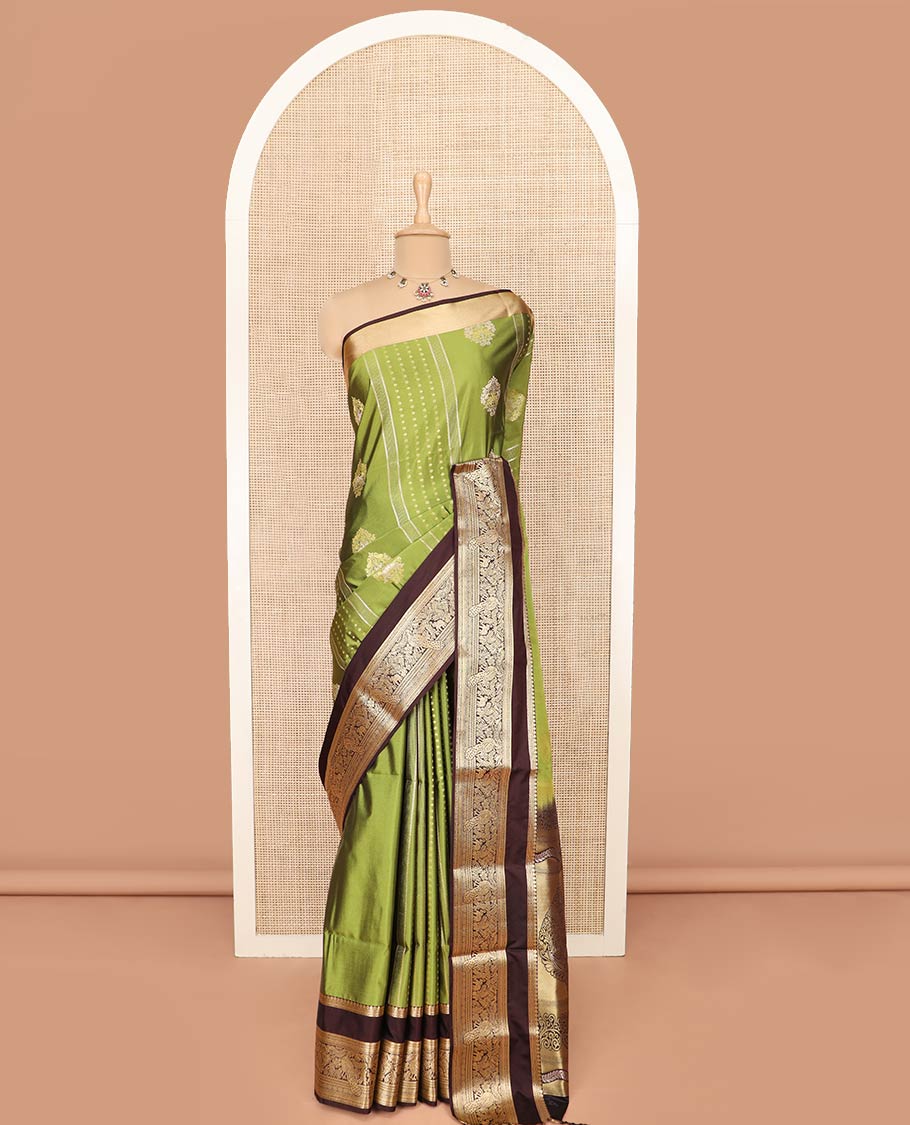 Green Semi-Soft Silk Saree Elevated with Intricate Designs Woven All Over Its Body, Complemented by Contrast Traditional Zari Design Rettai Pettu Border, Opulently Embellished Pallu of Intricate Zari Designs, and Paired with a Contrast Blouse - Image 3