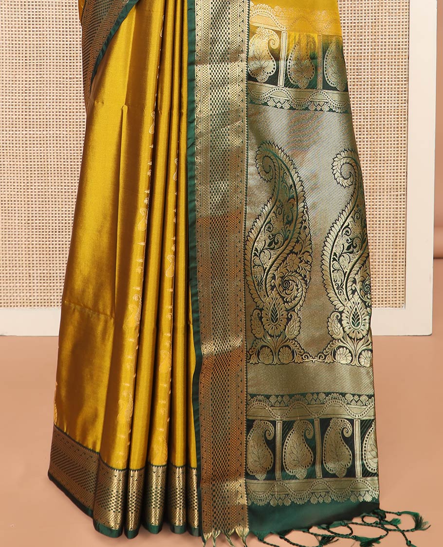 Green Semi-Soft Silk Saree Enlivened with Paisley Design Woven All Over Its Body, Complemented by a Contrast Traditional Zari Design Border, Pallu Highlighted with Paisley Designs, and Paired with a Contrast Blouse - Image 4