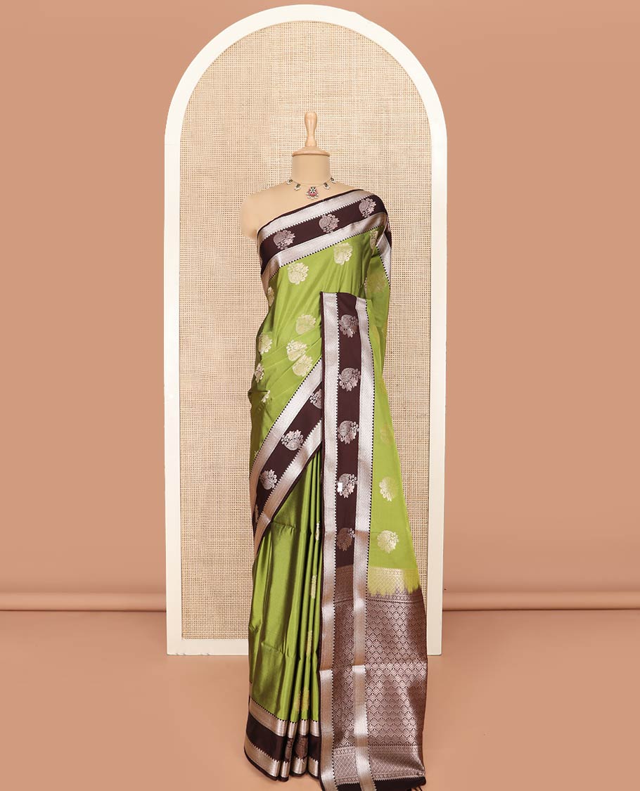 Green Semi-Soft Silk Saree Enriched with Floral Zari Buttas, Complemented by Contrast Traditional Zari Border Featuring Floral and Peacock Feather Motifs, Pallu Intricately Designed with Jaal Designs, and Paired with a Contrast Blouse - Image 3