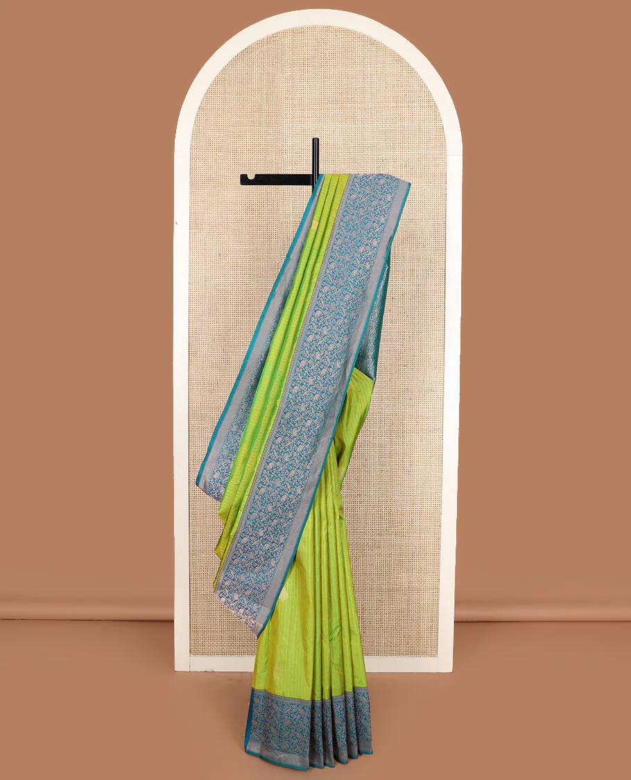 Green striped and zari buttas Vasundhara silk saree with contrast border of yaanai, killi, and kodi visiry designs, and jaal p