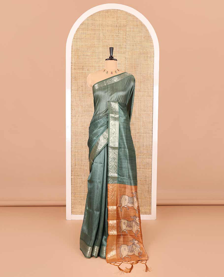Green striped semi-tussar saree, traditional zari border of floral creeper designs, contrast pallu of Pichwai cow print, and contrast Pichwai cow printed blouse - Image 2