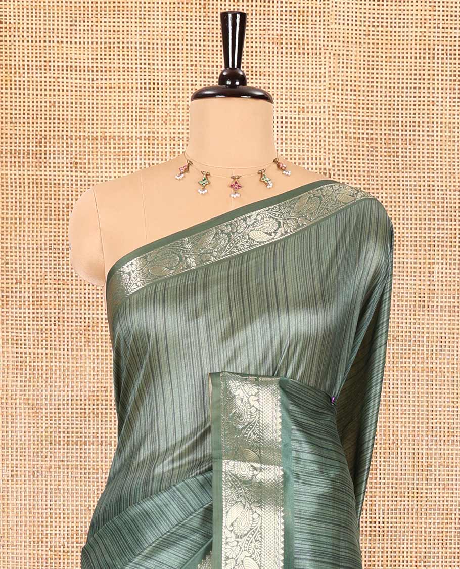 Green striped semi-tussar saree, traditional zari border of floral creeper designs, contrast pallu of Pichwai cow print, and contrast Pichwai cow printed blouse - Image 3