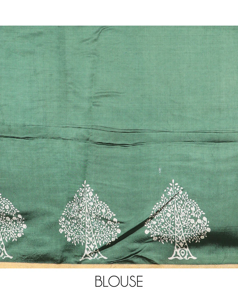 Green tree motifs printed banana pith saree, zari border, and floral printed pallu - Image 5