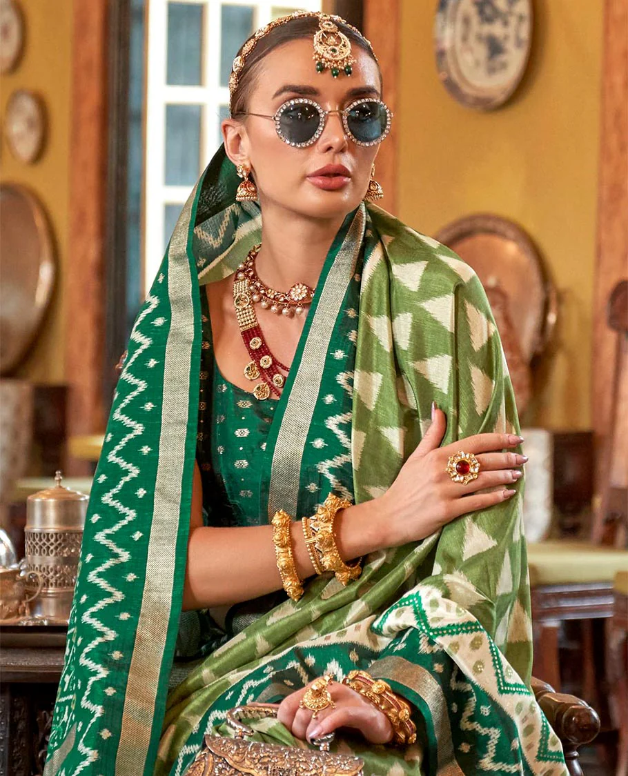 Green triangle buttas patola designer catalog saree, contrast ikkat geometric border and pallu of ikkat jaal design - Image 2