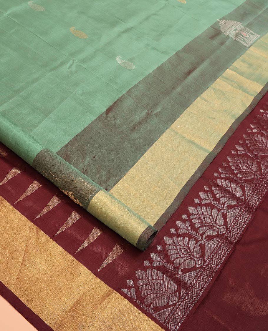 Green Uppada Silk Saree Accentuated with Paisley Buttas, Subtle Contrast Border of Temple Gopuram Motifs, Captivating Pallu Featuring Floral Jaal Design, and Paired with a Contrast Blouse - Image 2