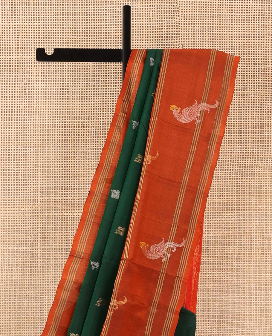 Green Uppada Silk Saree Enlivened With Zari Buttas, Captivating Contrast Border Featuring Zari Stripes And Peacock Motifs, Pallu Depicting Rose Flower-Enclosed Mughal-Style Arches, And Paired With A Contrast Blouse - Image 3