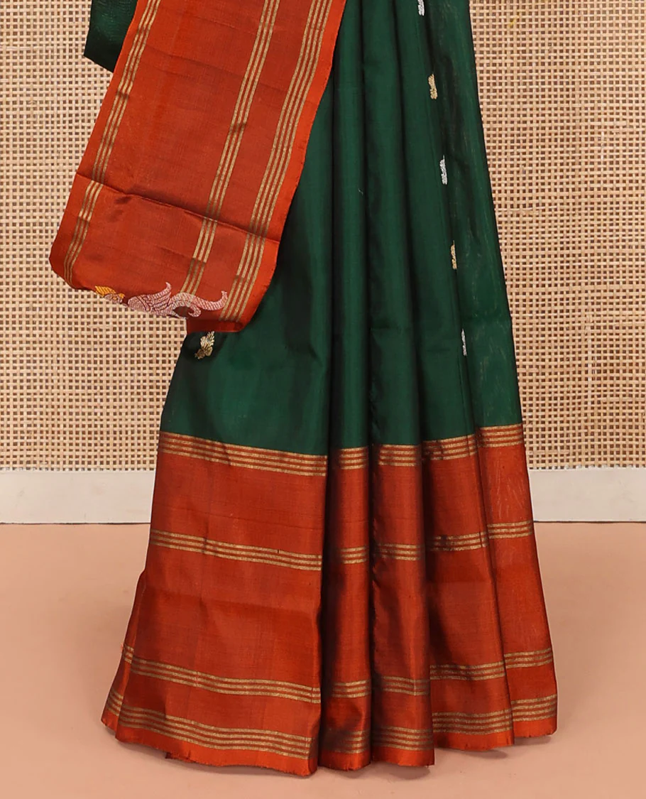 Green Uppada Silk Saree Enlivened With Zari Buttas, Captivating Contrast Border Featuring Zari Stripes And Peacock Motifs, Pallu Depicting Rose Flower-Enclosed Mughal-Style Arches, And Paired With A Contrast Blouse - Image 4