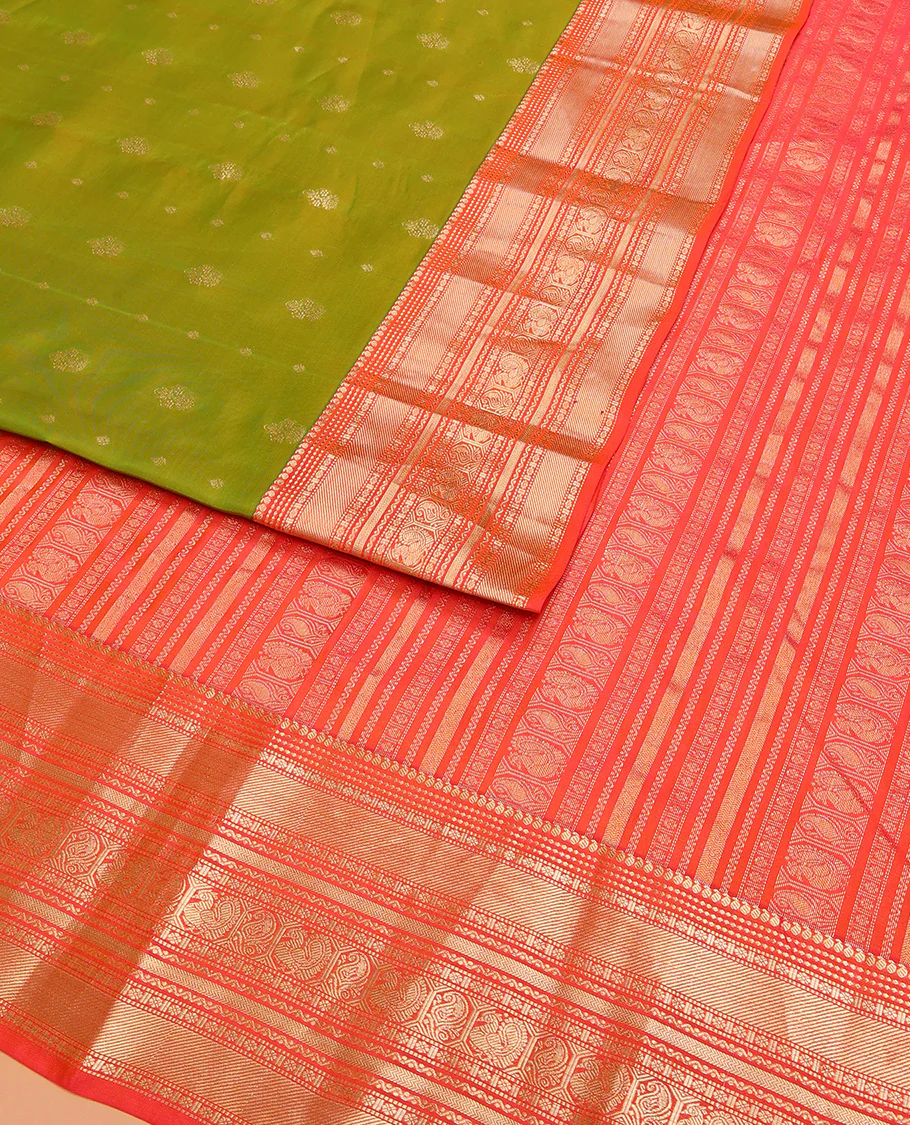 Green Vasundhara Lite Silk Mix Saree Accentuated with Zari Buttas, Complemented with a Contrast Border Featuring Manga, Muthu, Kamalam, Neli, Vanki, and Mayil Designs, a Grandly Zari-Decked-Up Pallu, and a Contrast Blouse - Image 2