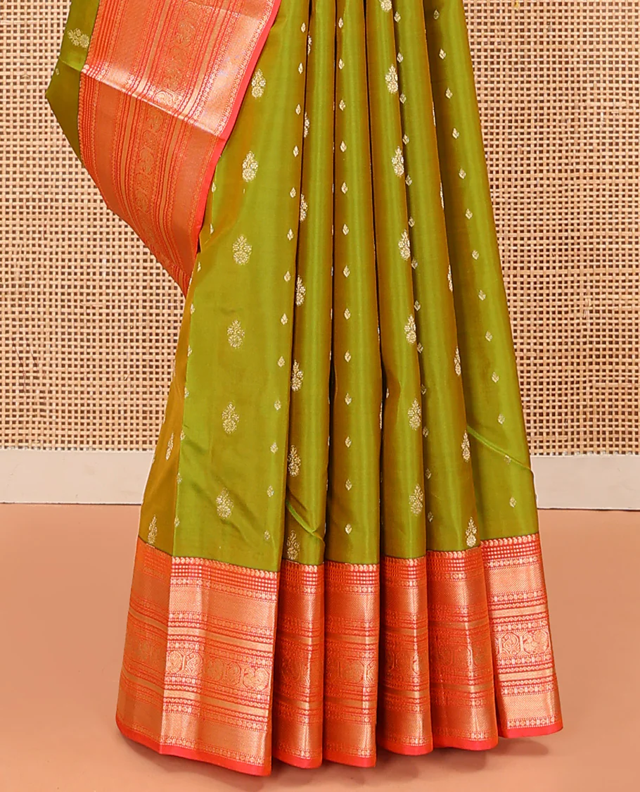 Green Vasundhara Lite Silk Mix Saree Accentuated with Zari Buttas, Complemented with a Contrast Border Featuring Manga, Muthu, Kamalam, Neli, Vanki, and Mayil Designs, a Grandly Zari-Decked-Up Pallu, and a Contrast Blouse - Image 4