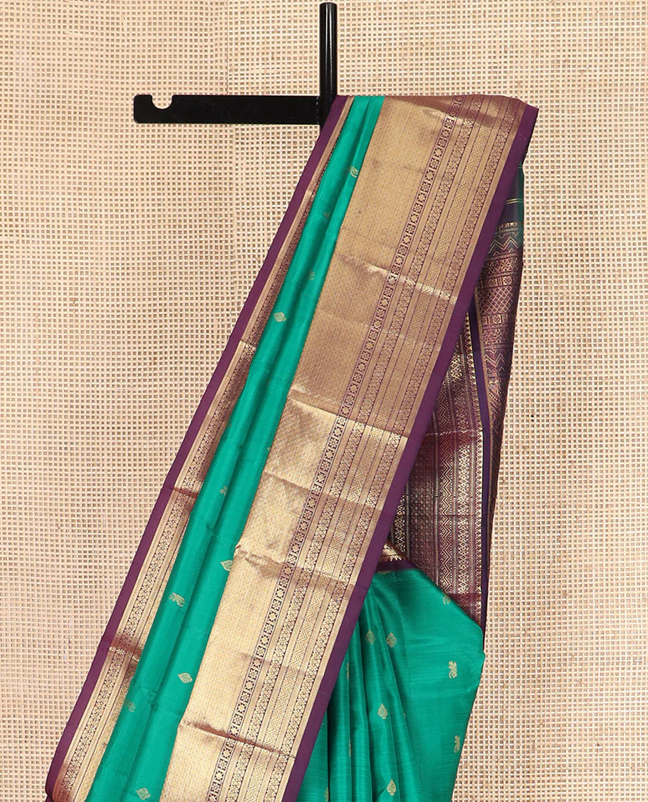 Green Vasundhara Silk Saree Subtly Sparked with Zari Buttas, Highlighted with a Contrast Big Zari-Decked Traditional Motifs Woven Border, Pallu Steeped with Traditional Zari Designs, and Paired with a Contrast Blouse - Image 3