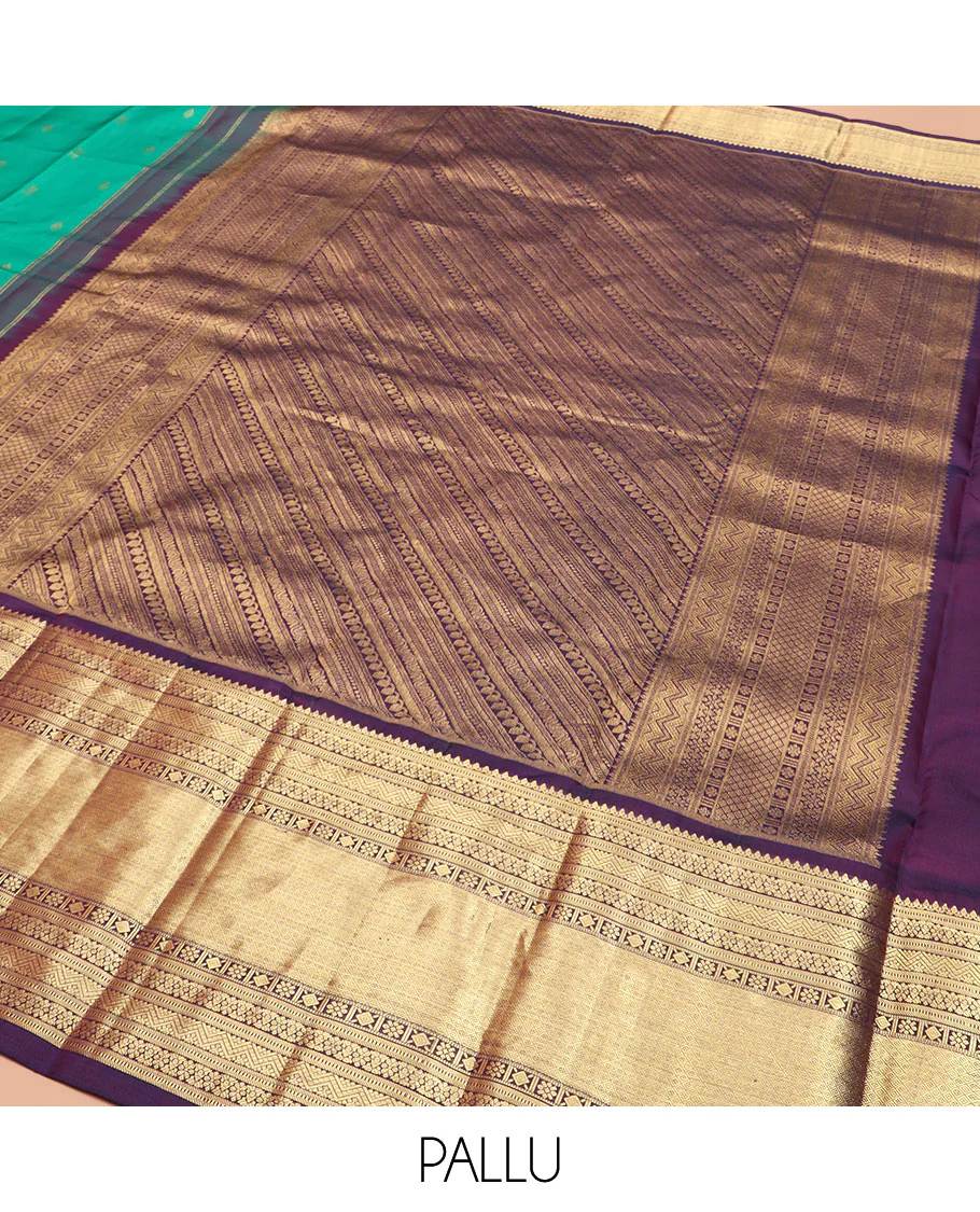 Green Vasundhara Silk Saree Subtly Sparked with Zari Buttas, Highlighted with a Contrast Big Zari-Decked Traditional Motifs Woven Border, Pallu Steeped with Traditional Zari Designs, and Paired with a Contrast Blouse - Image 5